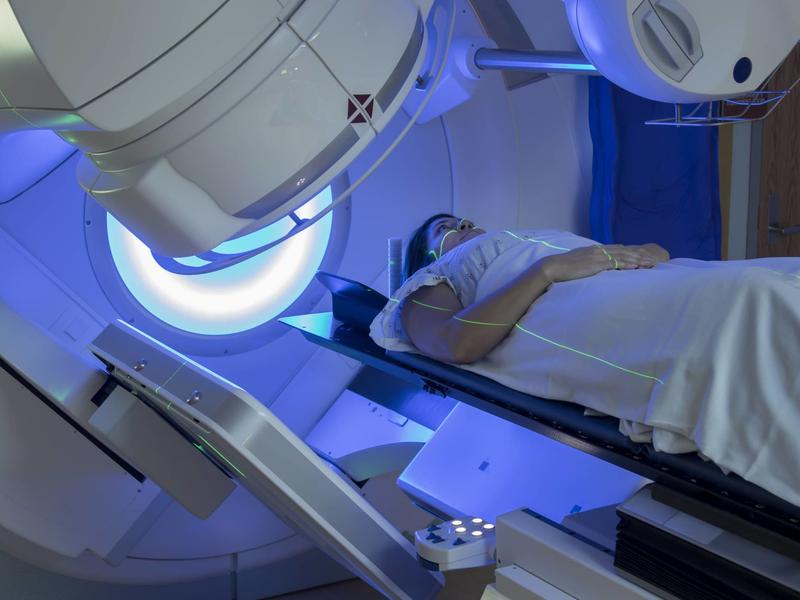 patient being placed into machine for radiation treatment