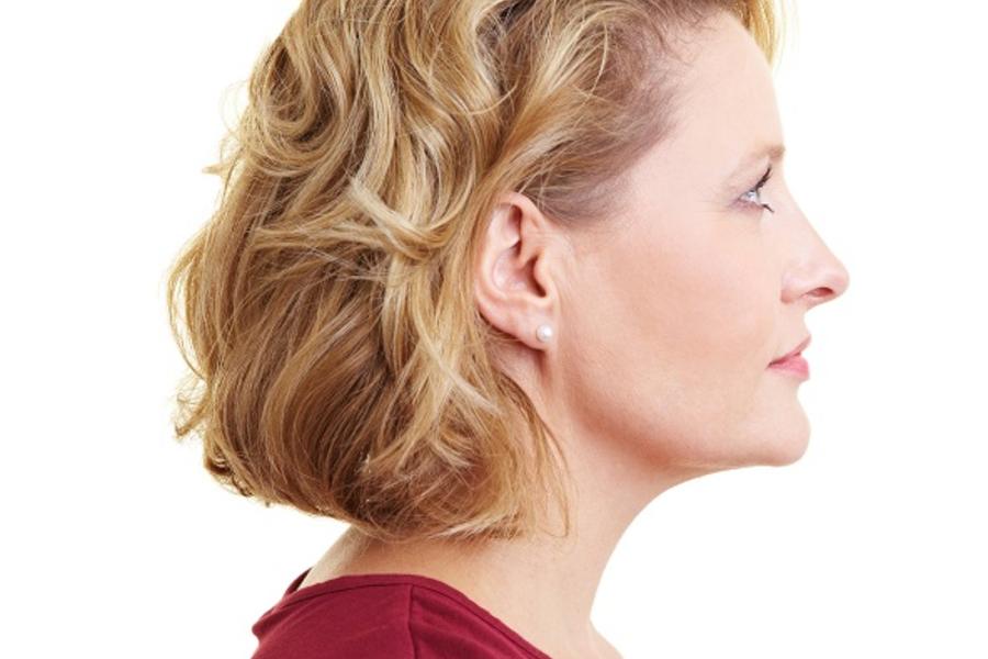 Side profile view of a woman's face.