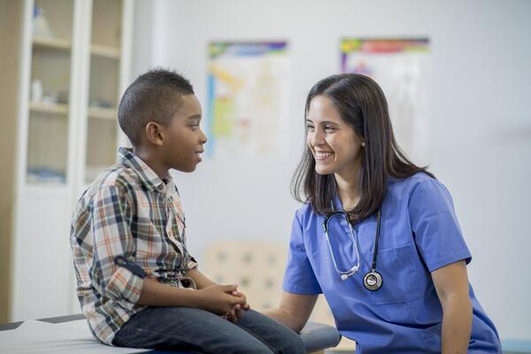 Nurse talking with child