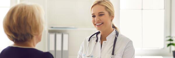 Doctor talking with patient